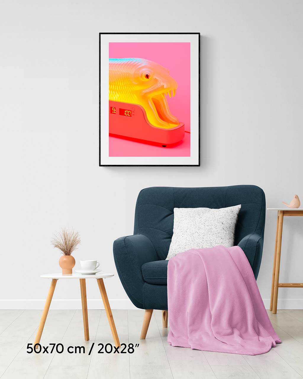 Framed poster on the wall. The poster depicts a stylized snake-shaped alarm clock.