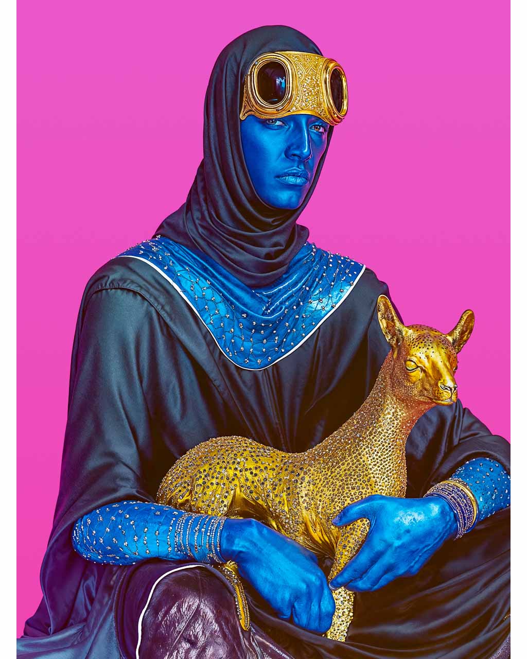 Surrealistic image of a blue man holding a golden lamb